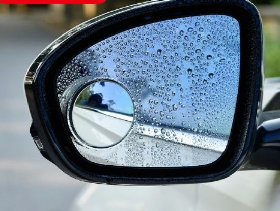 Picture of Car suction cup type rearview mirror with no edge on the car